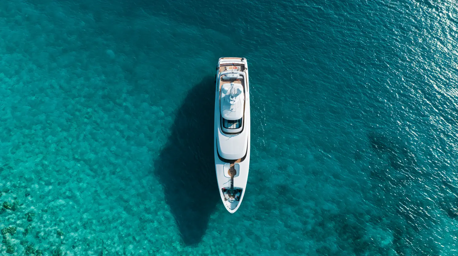 Aerial view of a charter yacht on turquoise water